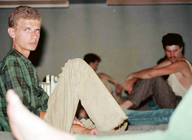 Bosnian Genocide (1992), Bosnian Muslim (Bosniak) prisoners in Omarska concentration camp.